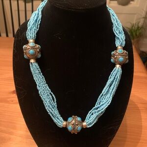 Vintage blue needed necklace.